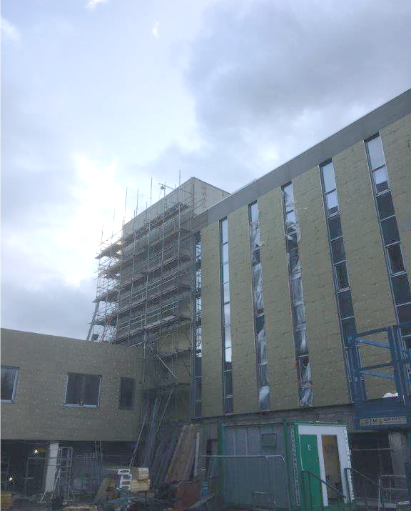 Scaffold now being re-erected on the rear building.
