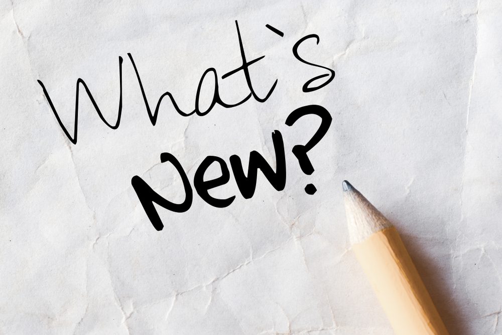 A piece of paper with 'What's New' written on it