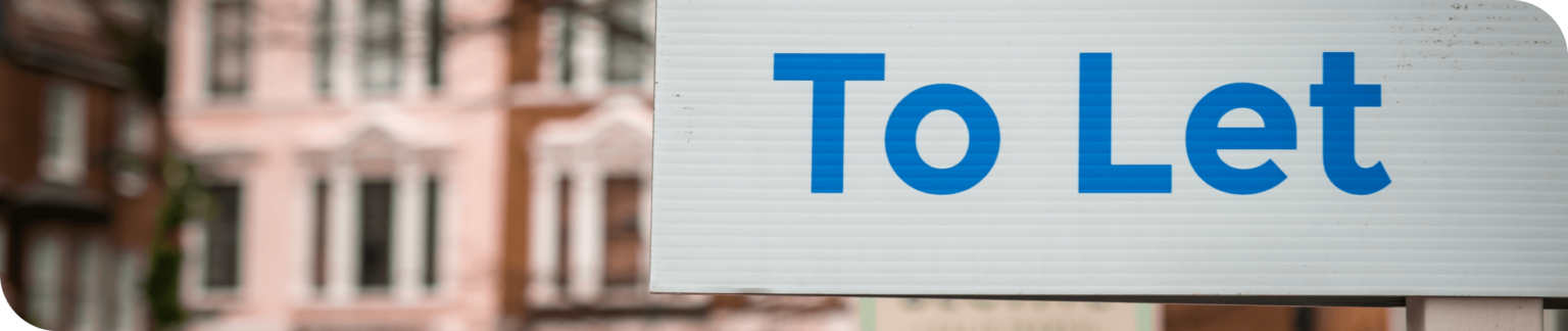 text 'To Let' on a sign