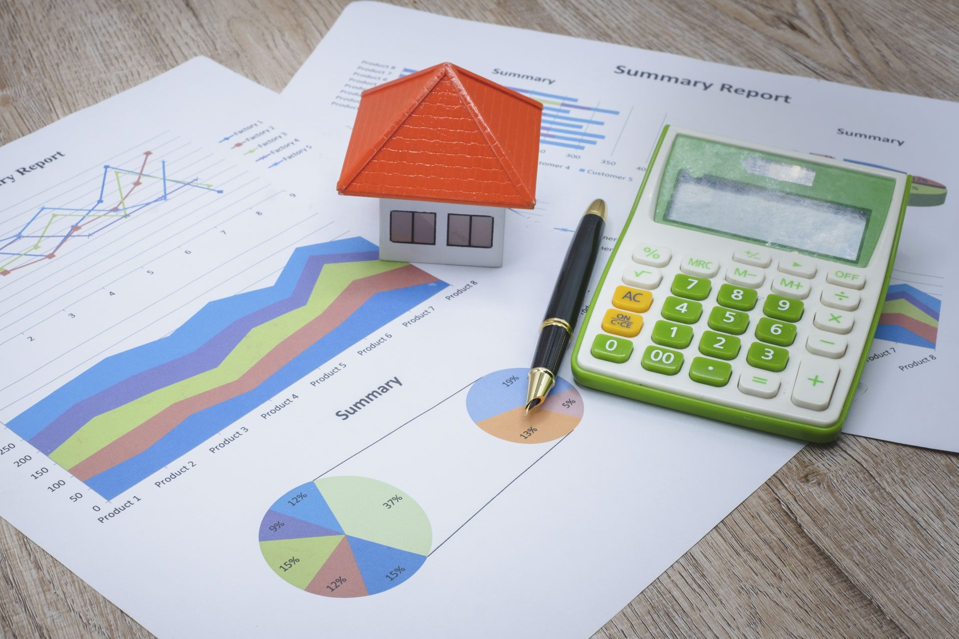 Buy to let tax calculations - paperwork with financial charts and a calculator