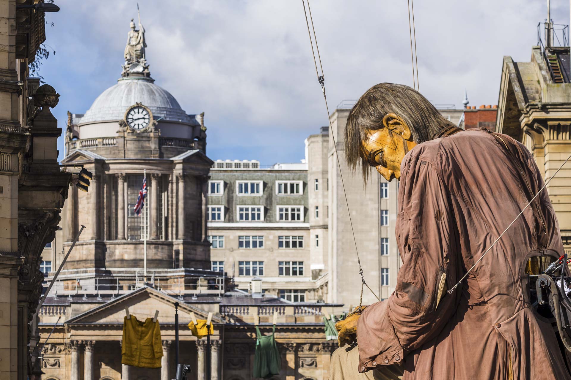 Liverpool Town Hall behind the sleeping giant man.