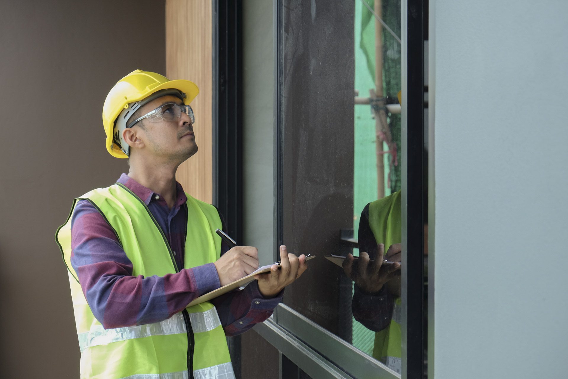 An inspector checking the quality of a building