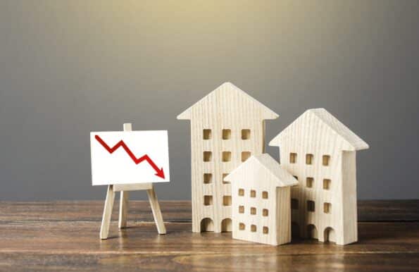 Wooden houses price dropping sign