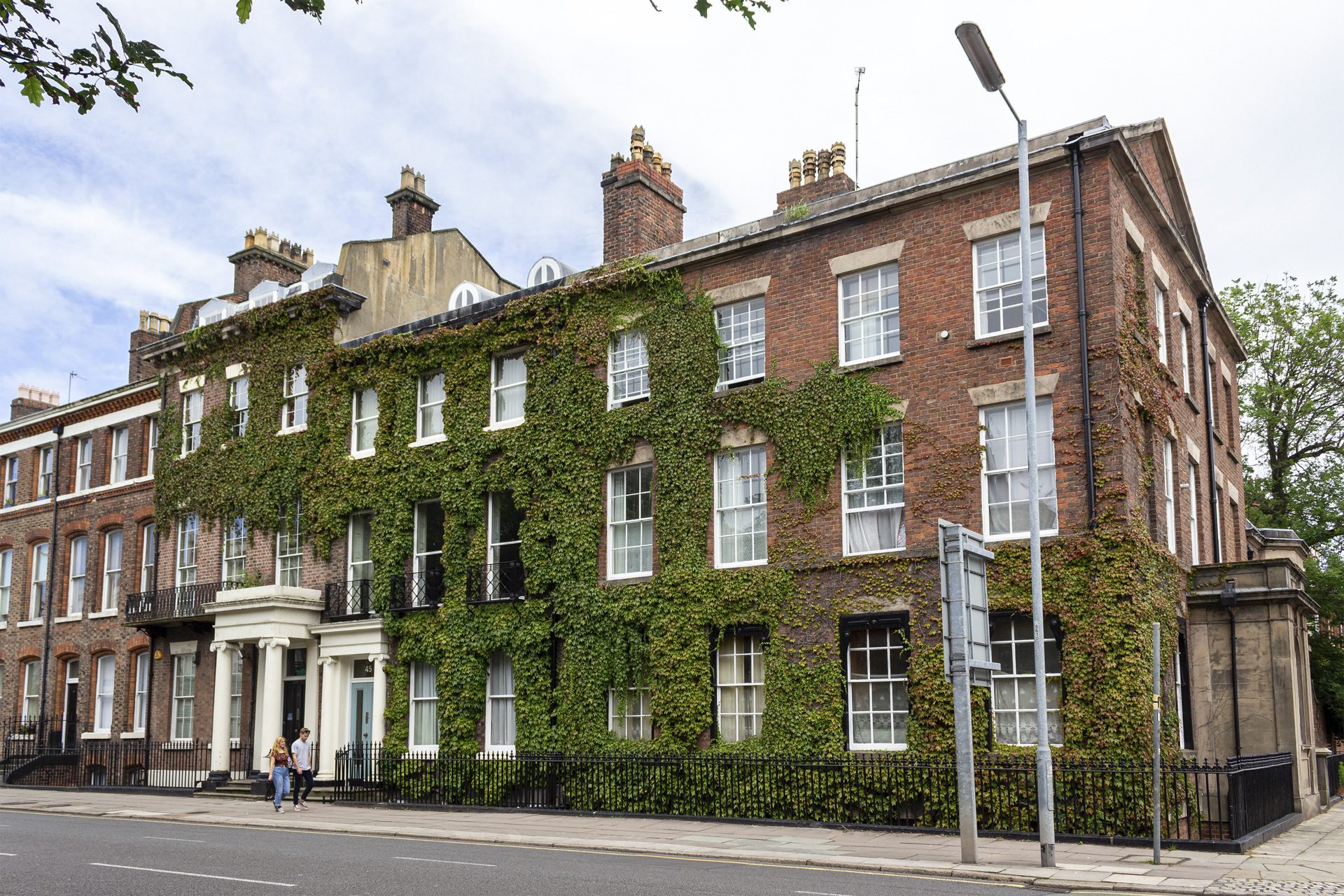 Liverpool / UK - July 6 2019: Ivy-covered houses on Catharine Street, Georgian Quarter, Liverpool.