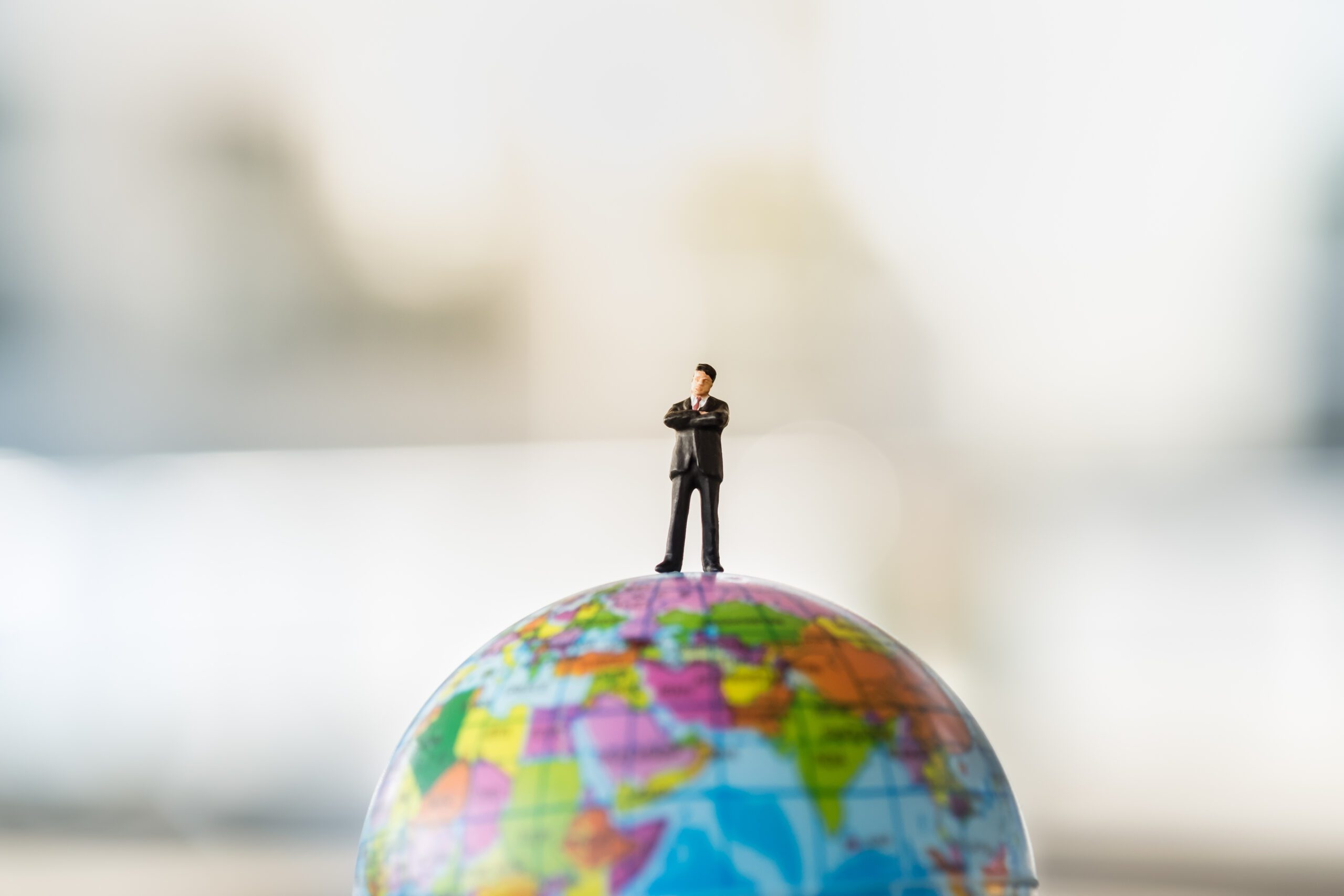 A person standing on a globe