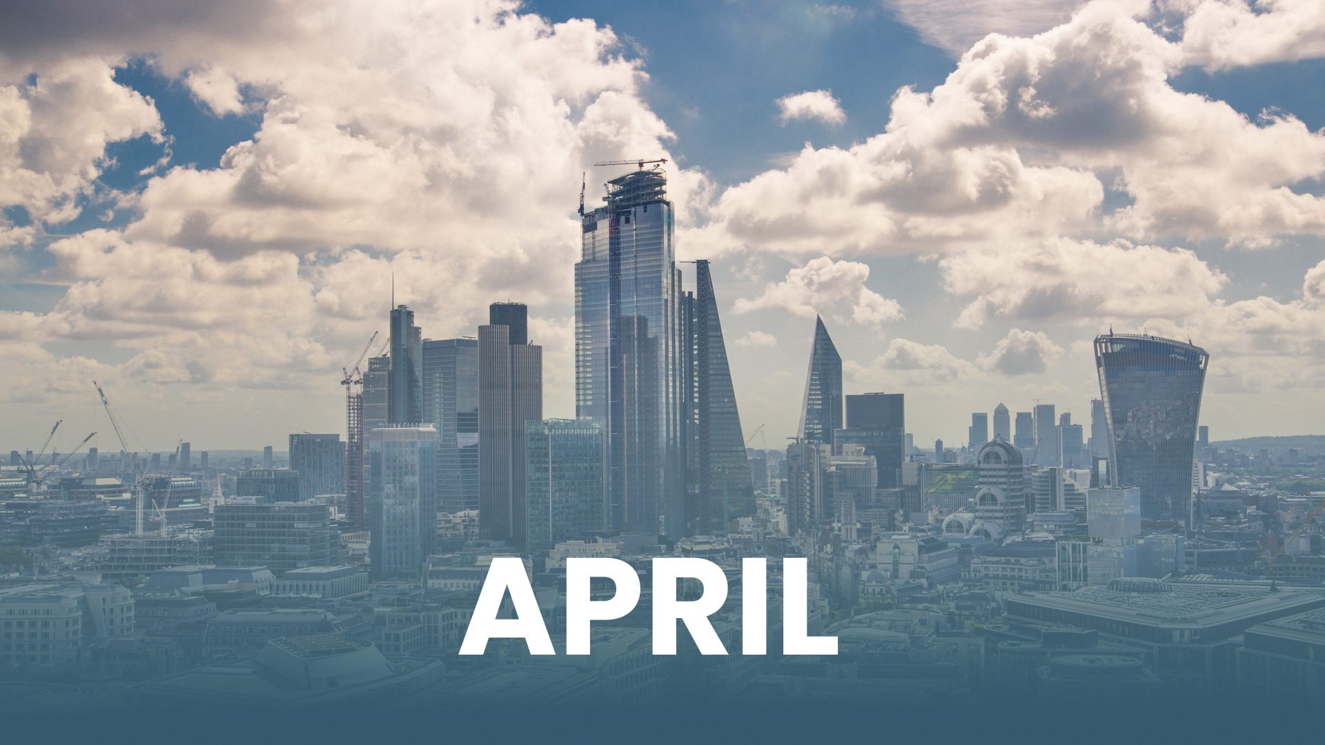 April text over city aerial view