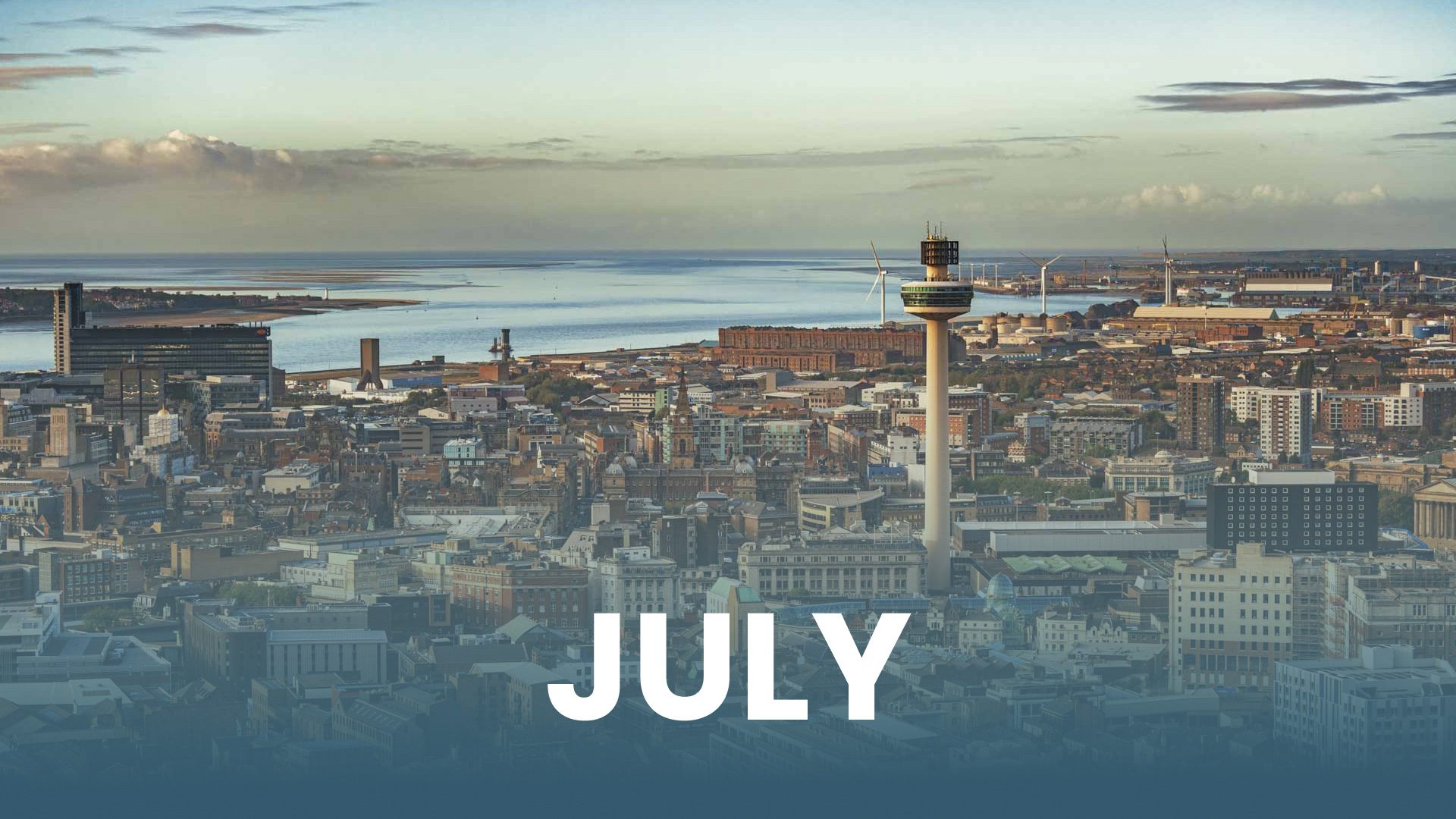 July text over city aerial view