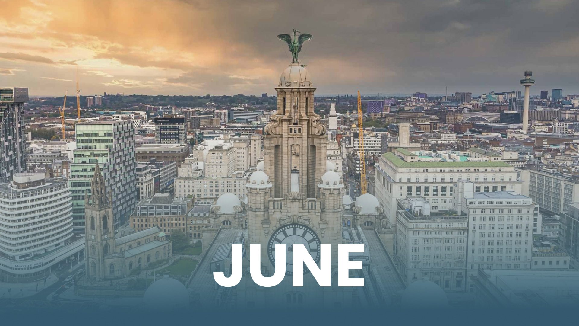 June text over city aerial view