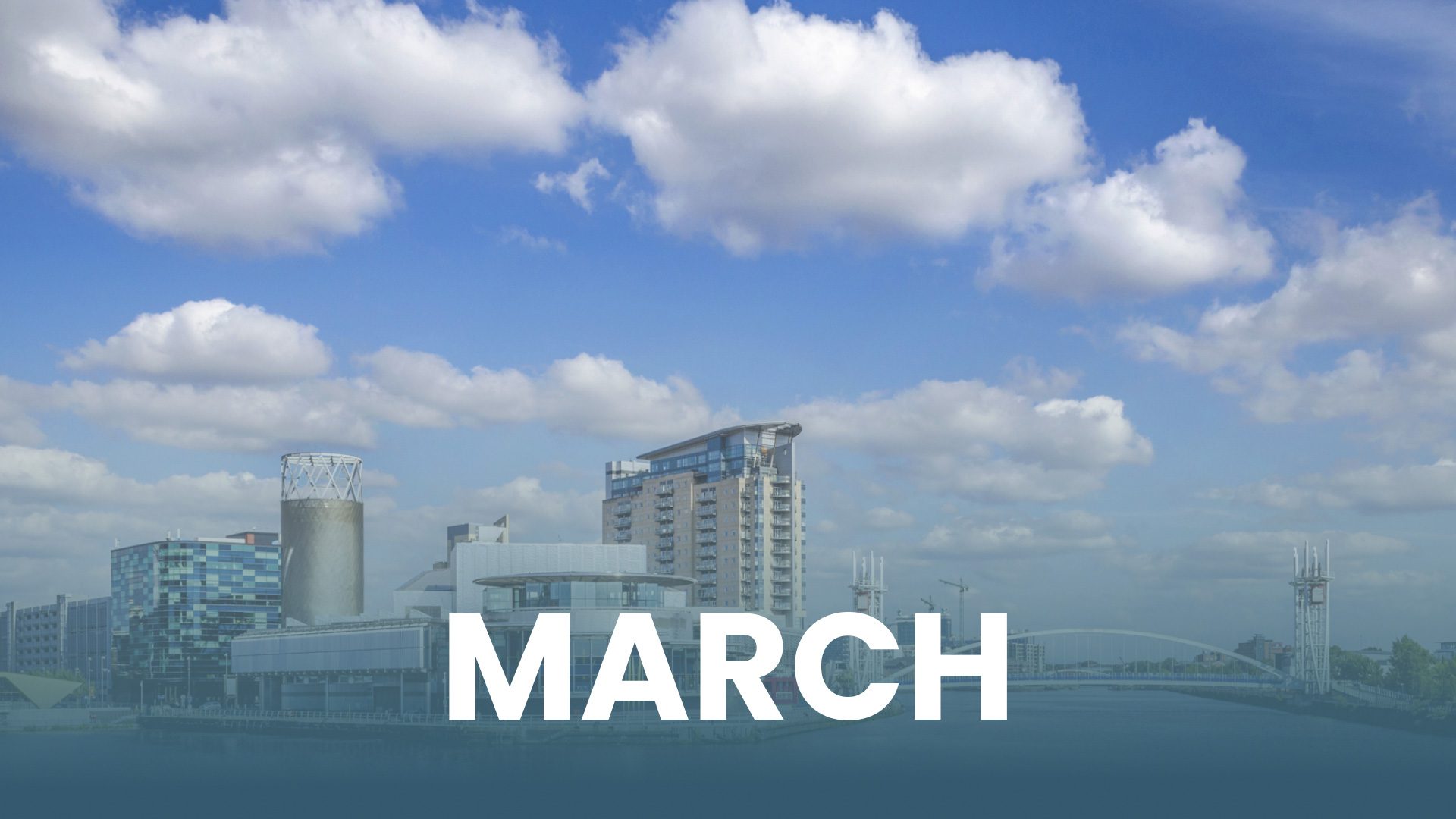 March text over city aerial view