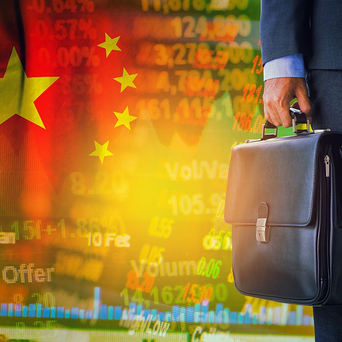 Chinese investor holding a bag