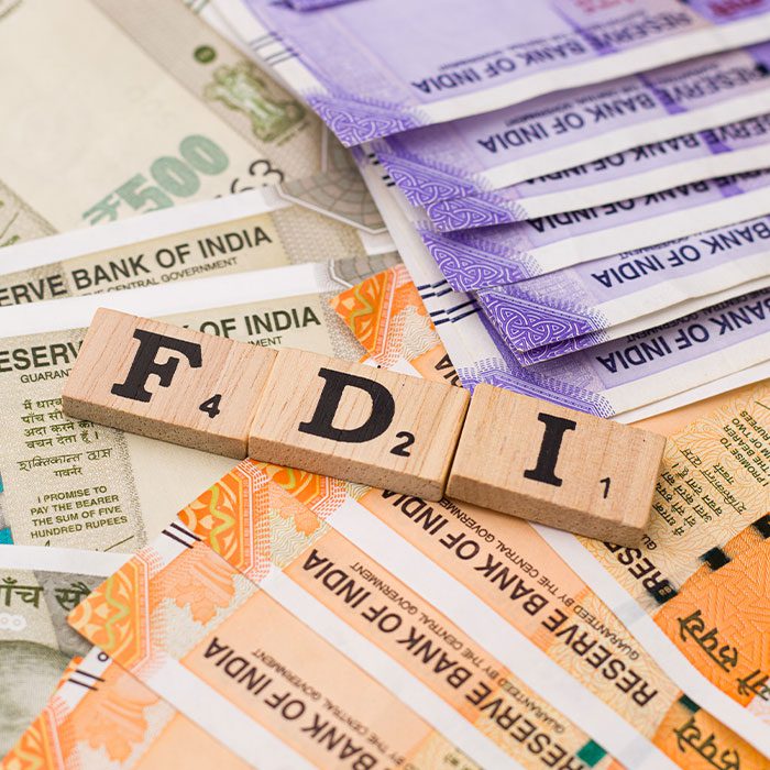 FDI blocks on stacks of bank notes