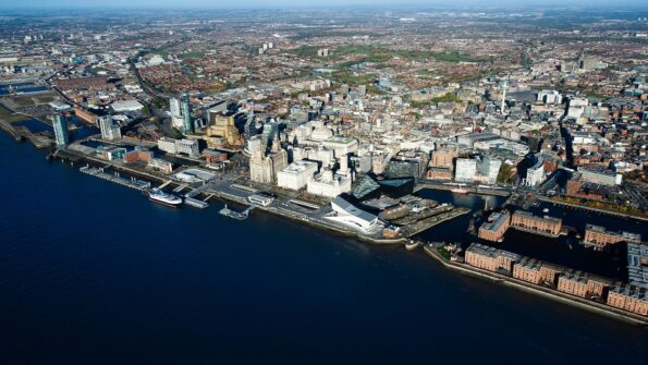 Aerial daytime view of Liverpool and River Mersey showing various areas of the city