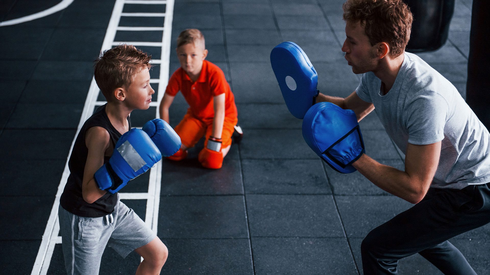 People boxing and training