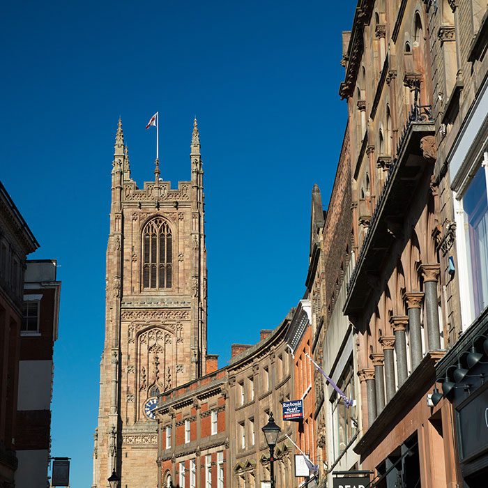 DERBY, ENGLAND - SEPTEMBER 13, 2019: View towards the cathedral from Iron Gate (street) in Derby, England