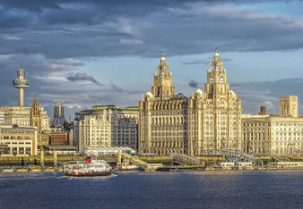 A view of Liverpool’s Liver Building and other buildings from across the water.