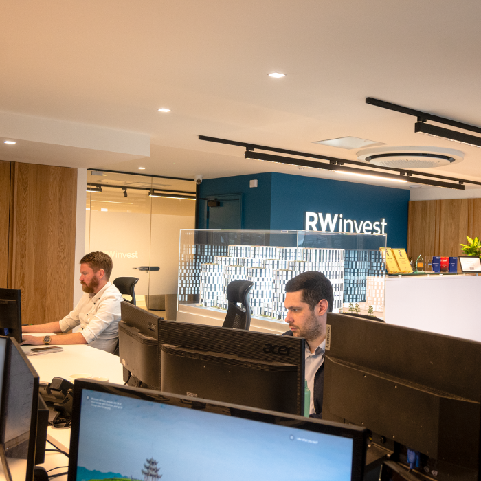 RWinvest office with staff working at desks