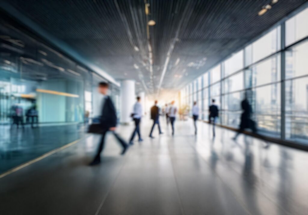 Blurred image of business people walking