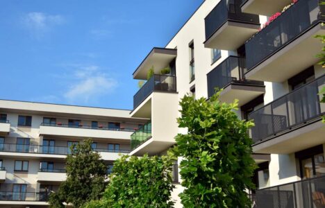 Brand new apartment building on sunny day