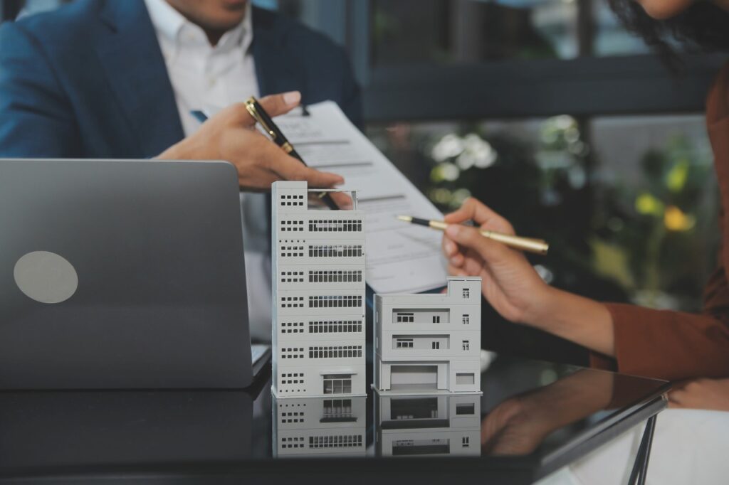 two person discussing a real estate property