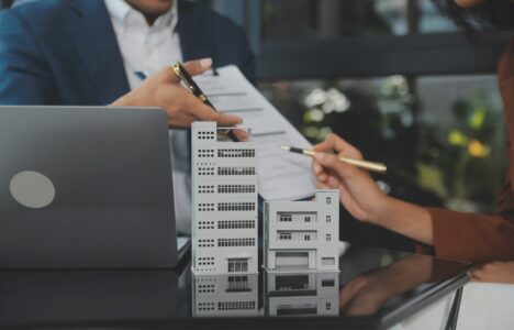 two person discussing a real estate property