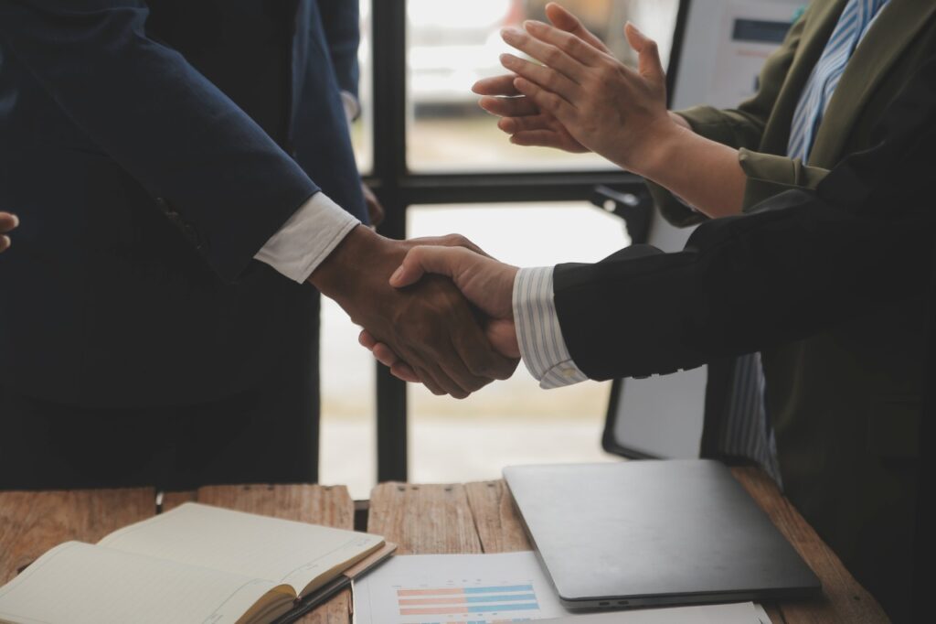 business people shaking hands