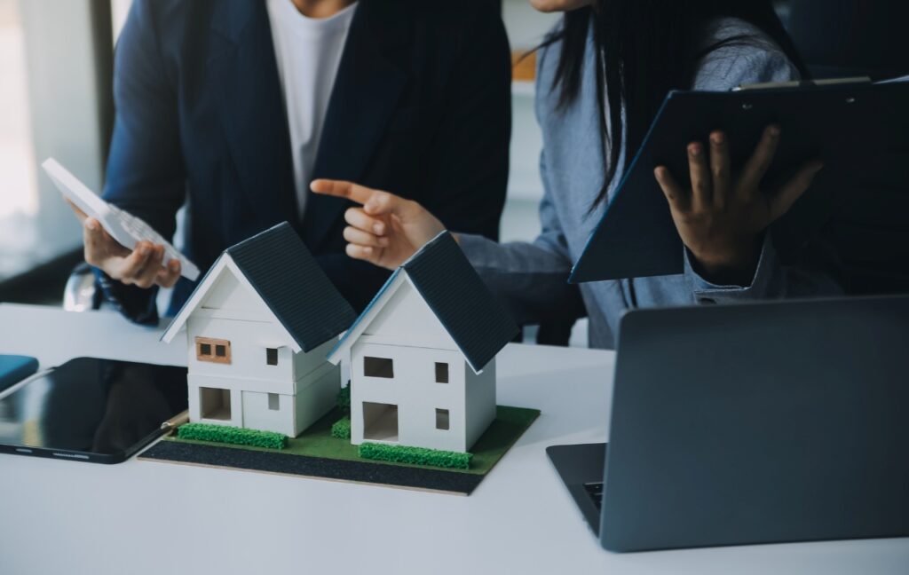 real estate broker agent presenting to a client