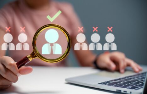 person holding a magnifying glass