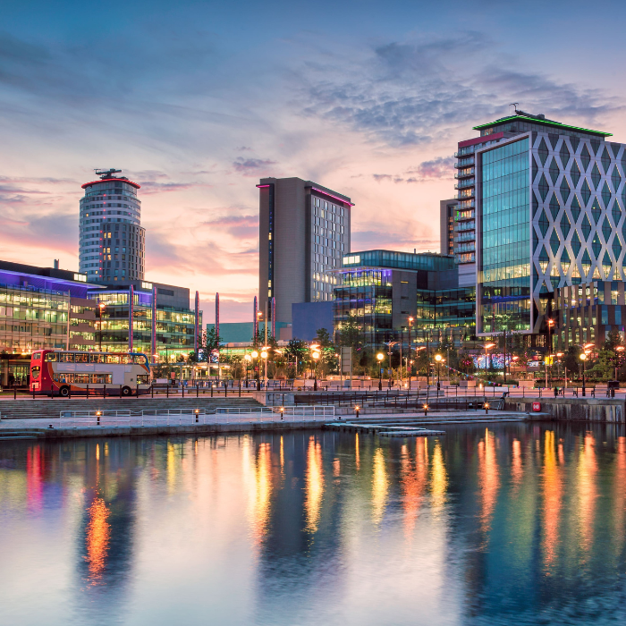 Manchester MediaCityUK skyline with evening sky and water