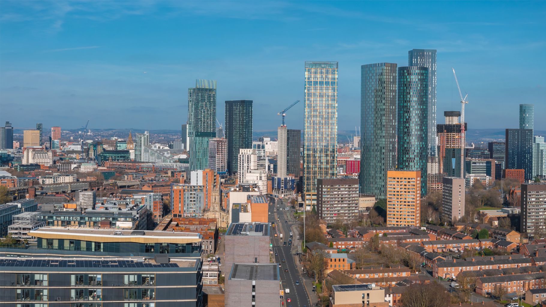 Manchester skyline with buildings and blue skies